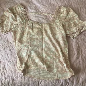 Pink top with white flowers